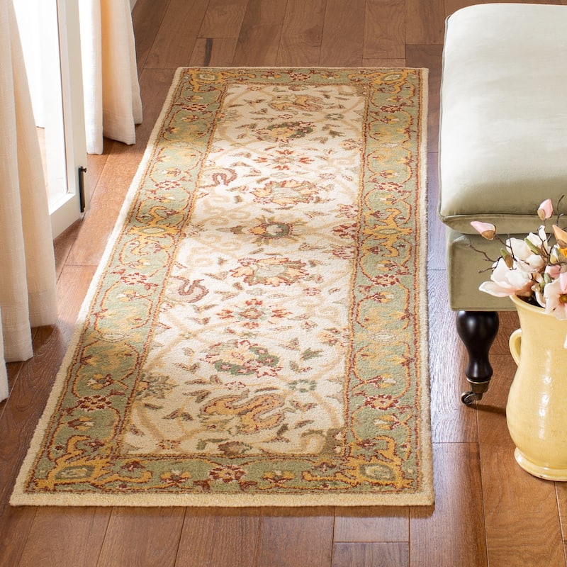 SAFAVIEH Handmade Antiquity Zuriñe Traditional Oriental Wool Rug - 2'3" x 10' Runner - Ivory