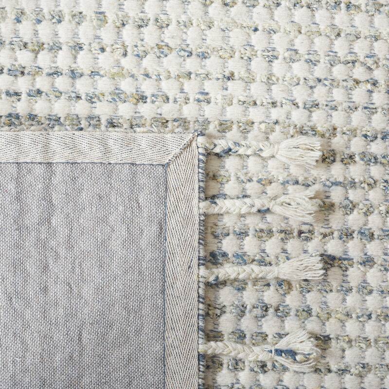 SAFAVIEH Handmade Casablanca Shag Ritsuko Wool Tassel Rug