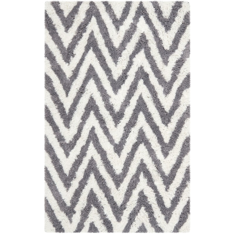 SAFAVIEH Handmade Kanesha Shag Karien Rug