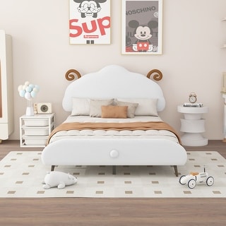 Velvet upholstered platform bed with sheep shaped headboard