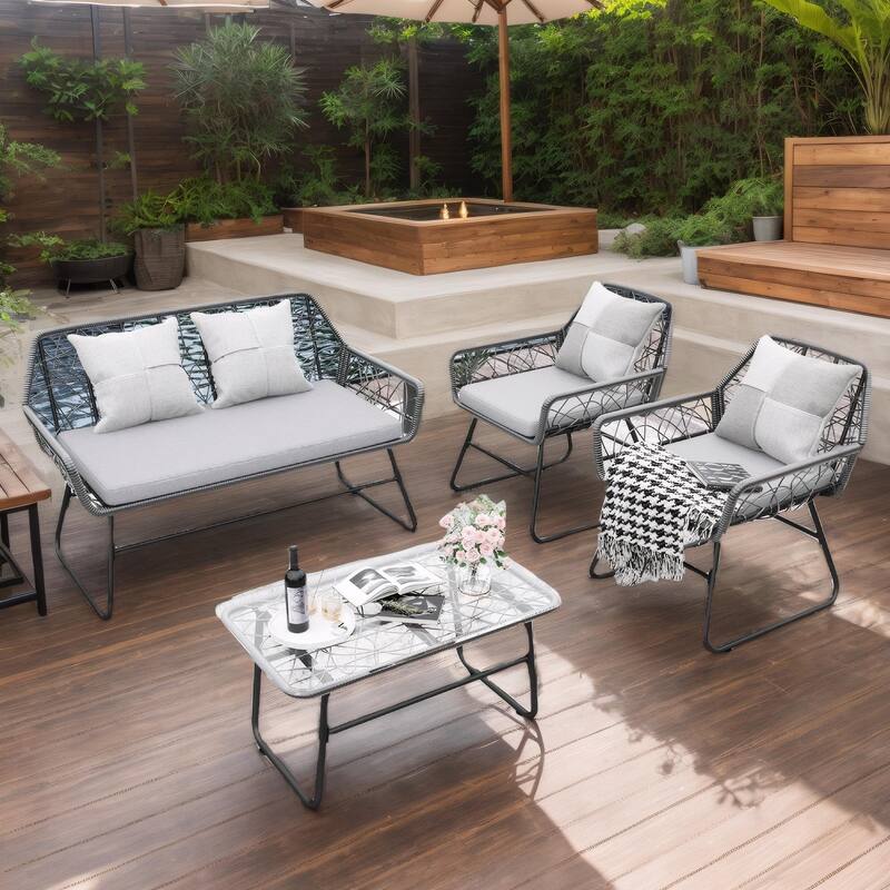 4-Piece Outdoor Rattan Sofa Set with Glass Table & Waterproof Cushions