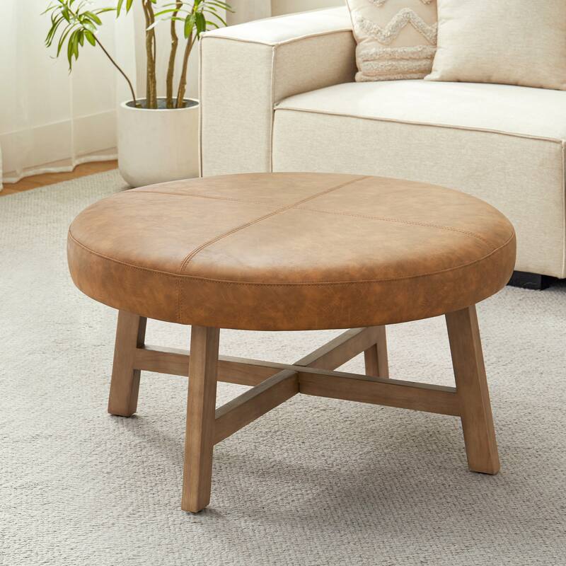 Round Upholstered Coffee Table with Solid Wood Base, Modern Fabric Ottoman Table for Living Room - Brown