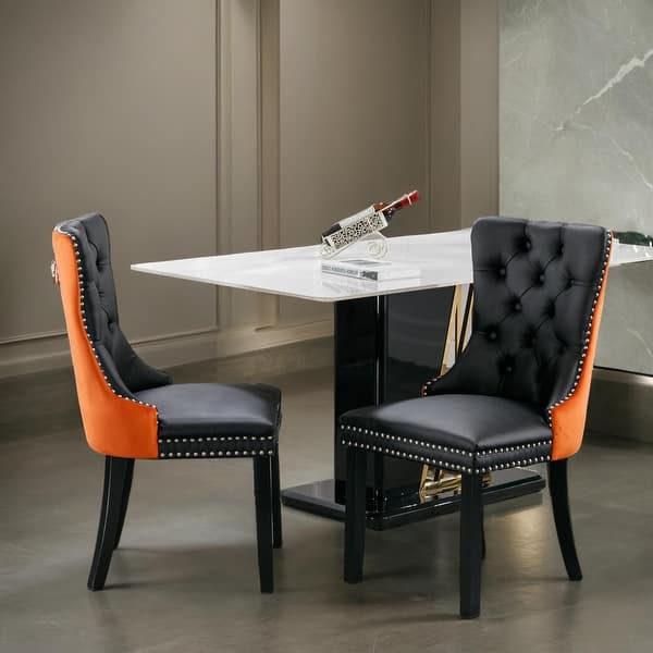 A Set of 12 Leather and Close Chrome Nailed Dining Chairs A Set of 12 Leather and Close Chrome Nailed Dining Chairs