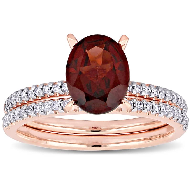 Miadora 14k Rose Gold Oval-cut Garnet and 1/4ct TDW Diamond Solitaire Bridal Ring Set