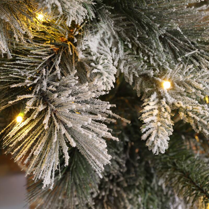 Glitzhome 11ft Pre-Lit Flocked Slim Pine Artificial Christmas Tree with 850 Lights and Foot Pedal