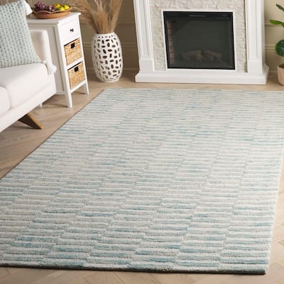 SAFAVIEH Hand-Tufted Ebony Eiliv Modern & Contemporary Wool Rug