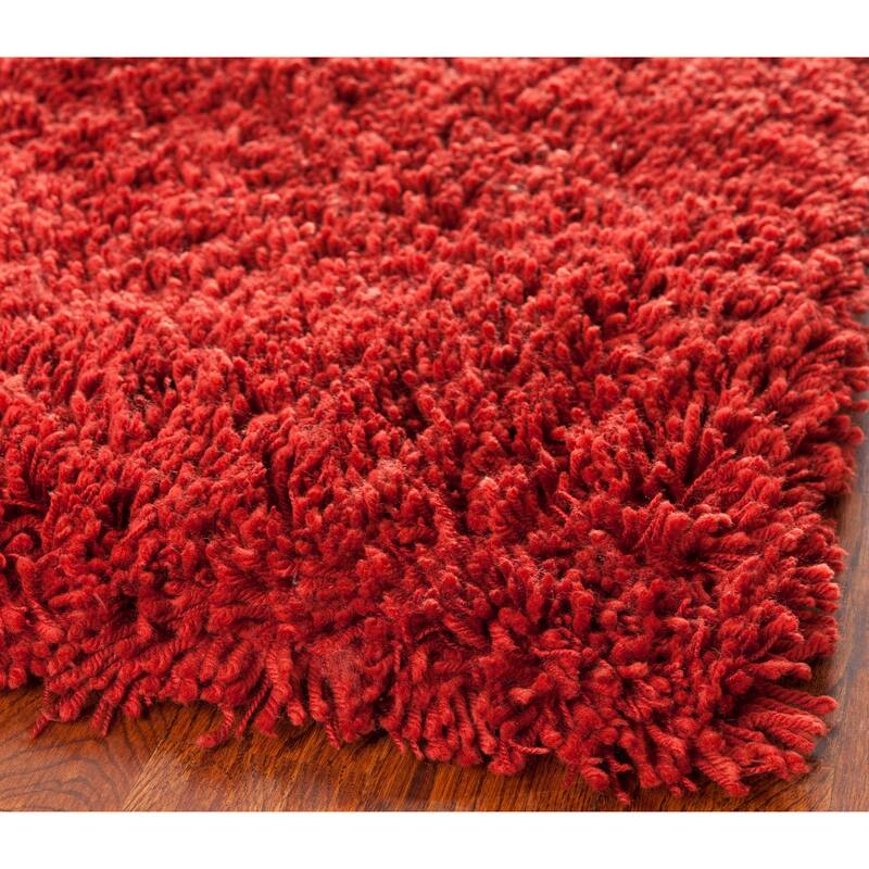SAFAVIEH Handmade Classic Shag Nakhshun Rug