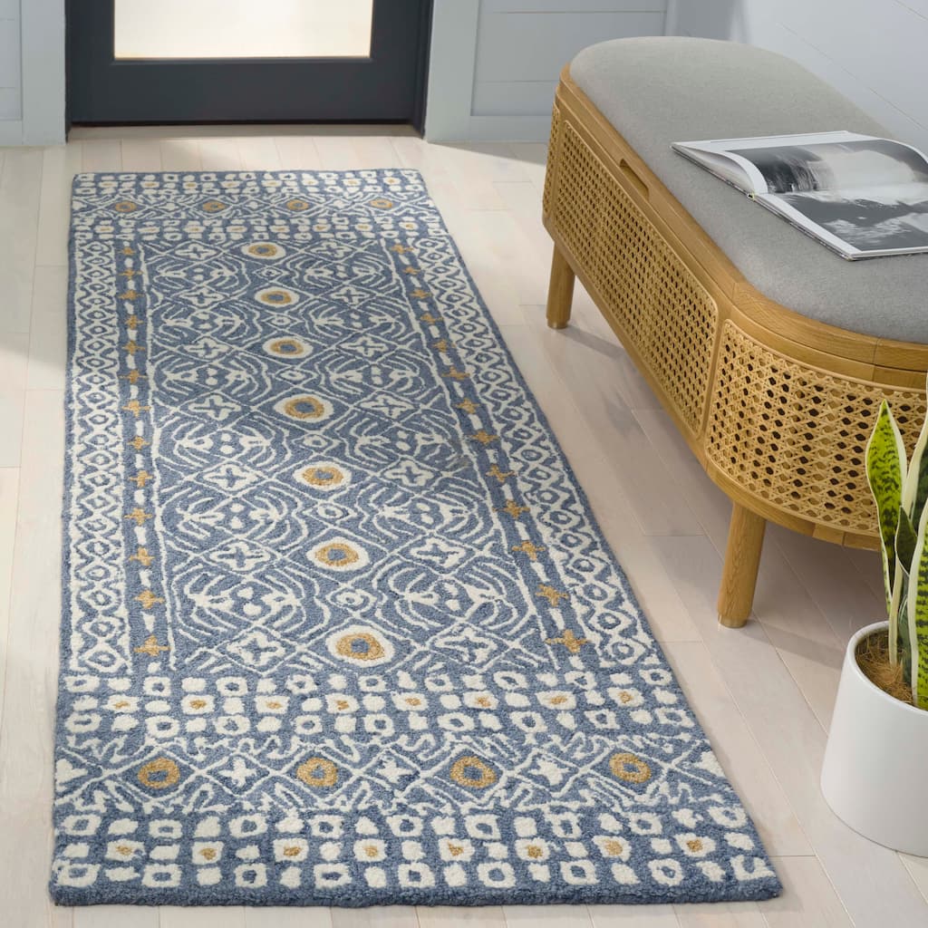SAFAVIEH Handmade Micro-Loop Reglind Wool Rug