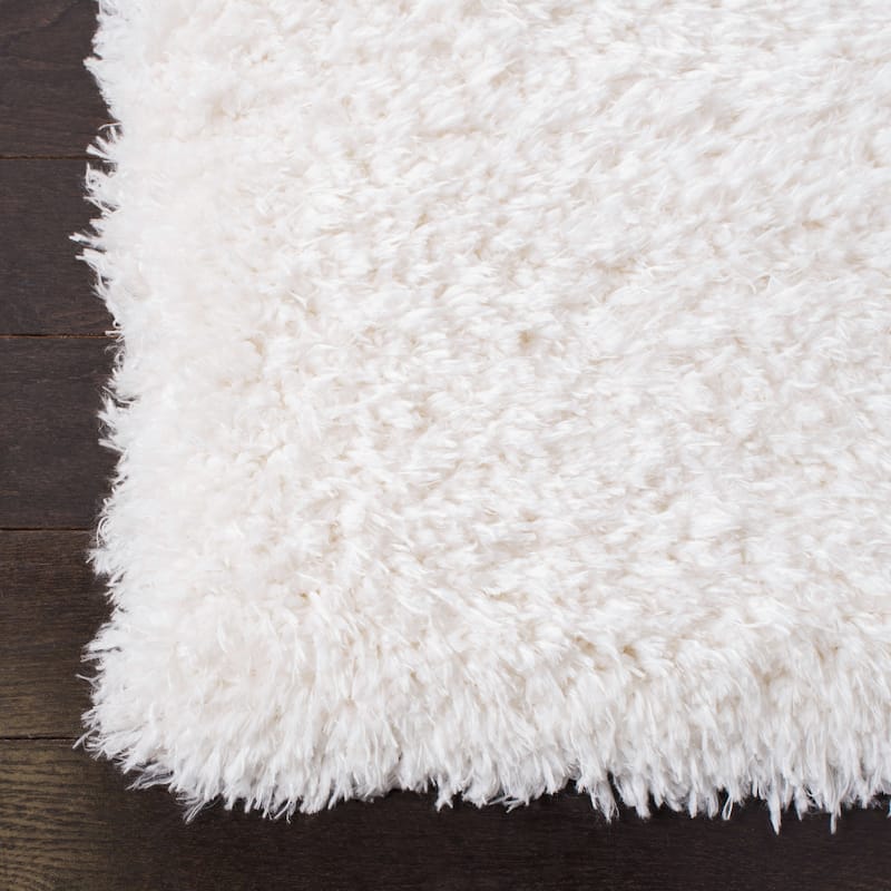 SAFAVIEH Flokati Vojsava Shag Solid Rug