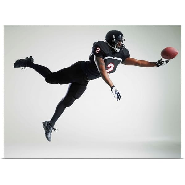 Shop Football Player Leaping In Mid Air To Catch Ball Poster