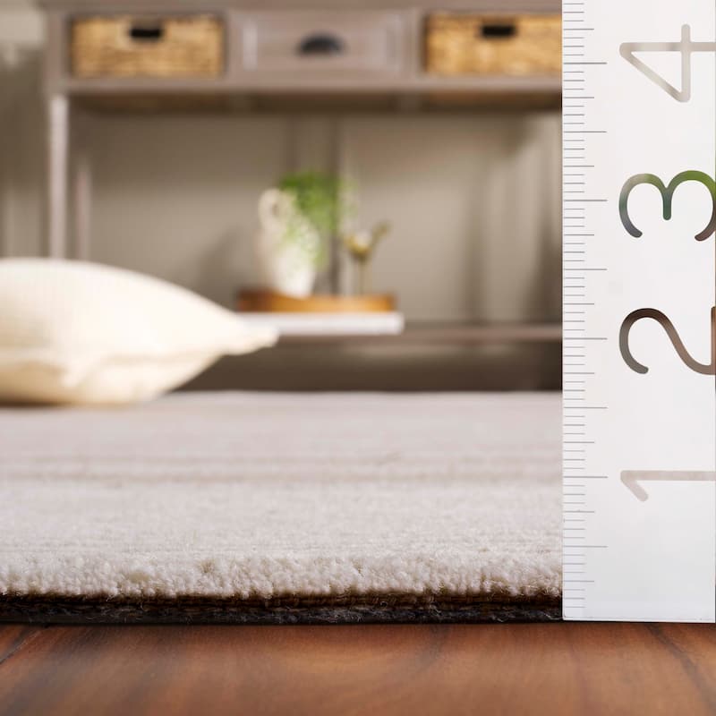 SAFAVIEH Handmade Pine Costanza Modern Wool Rug
