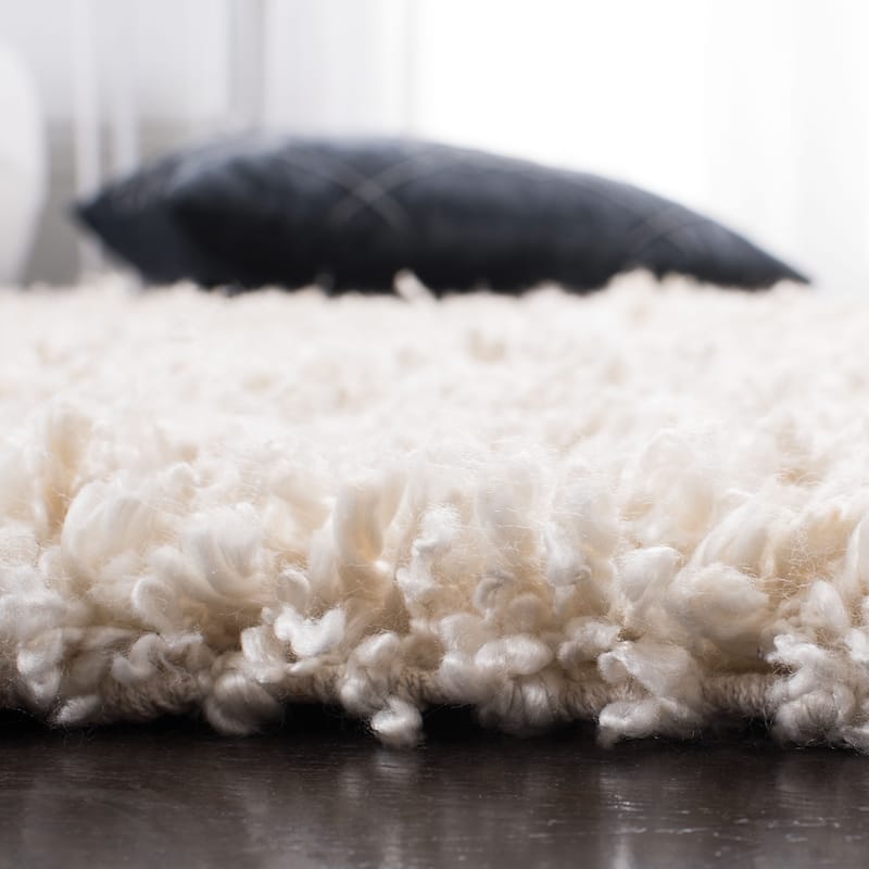 SAFAVIEH Handmade Sheep Shag Malti Solid Area Rug