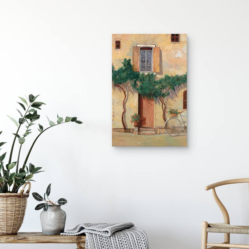 Mezza Bicicletta Sul Muro by Guido Borelli Canvas Art Print