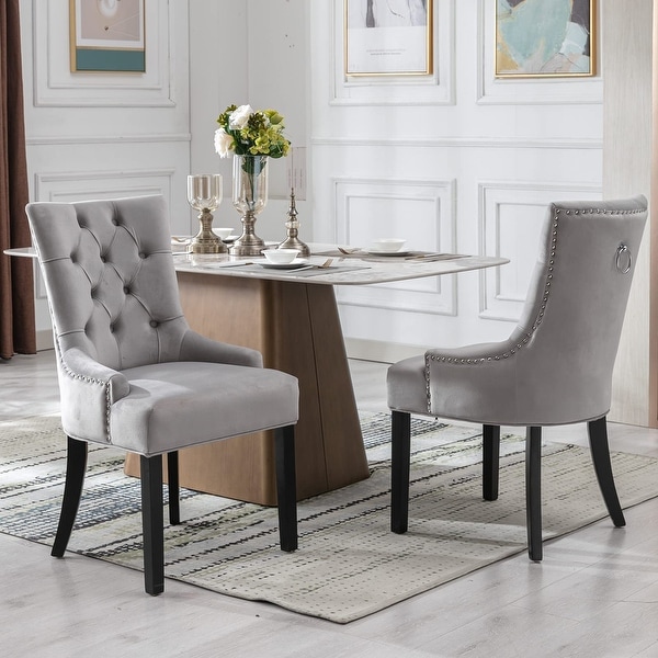 Grey tufted dining shop chairs with nailheads