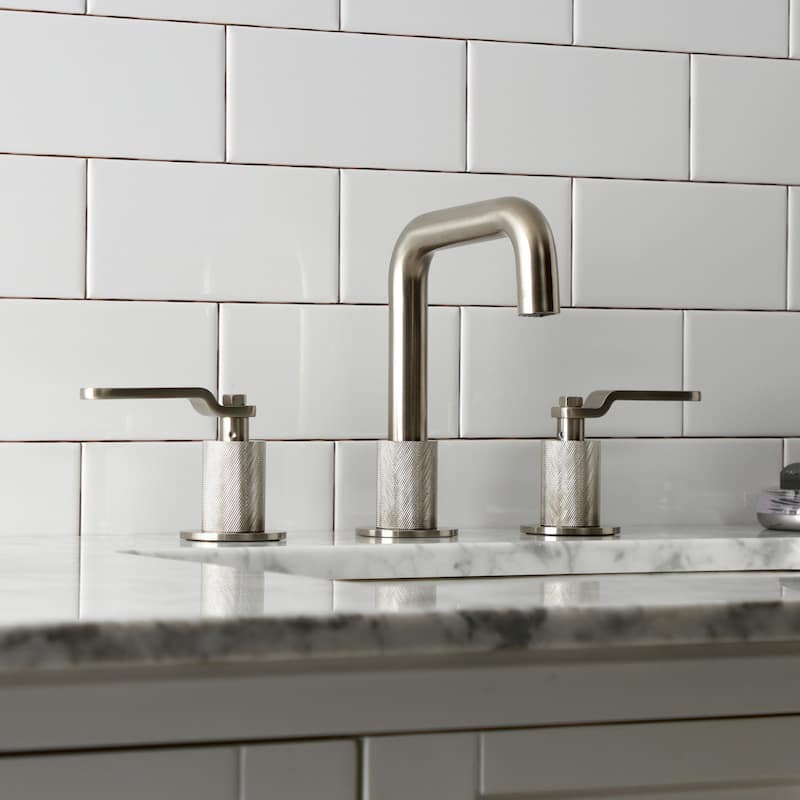 Kingston Brass Whitaker Two-Handle 3-Hole Deck Mount Widespread Bathroom Faucet with Push Pop-Up