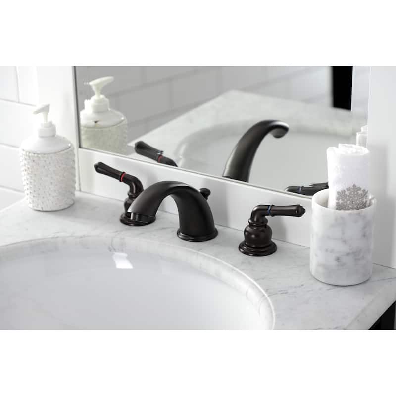 Kingston Brass Magellan Deck Mount Widespread Bathroom Faucet with Brass Pop-Up