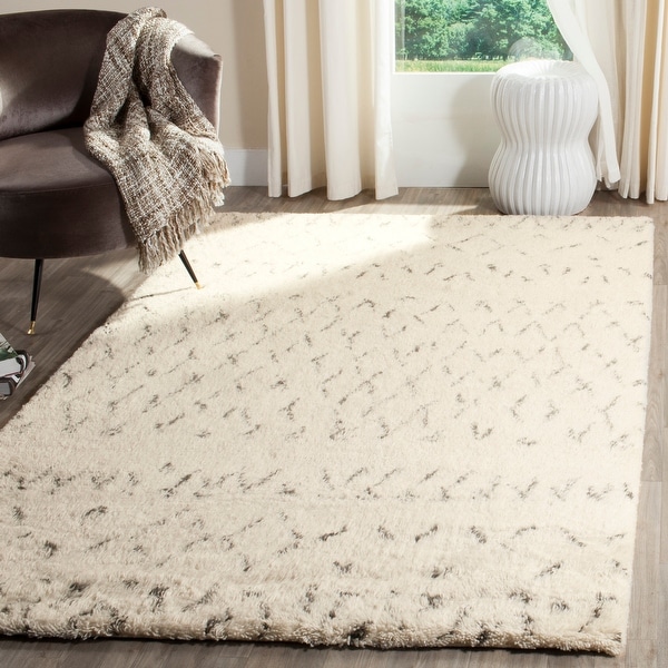 Safavieh Handmade Casablanca Shag Ardith Tribal Wool Rug. Opens flyout.