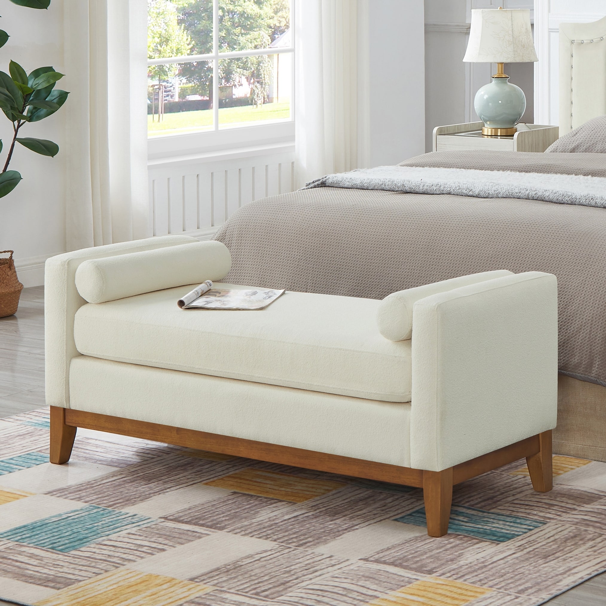 Large Upholstered Fabric Ottoman with Pillows