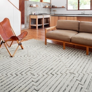 https://ak1.ostkcdn.com/images/products/is/images/direct/364ff544100dbab3f2631ba1d26b13ff00f9f931/Alexander-Home-Vail-Mid-century-Modern-Triangle-Stripe-Area-Rug.jpg