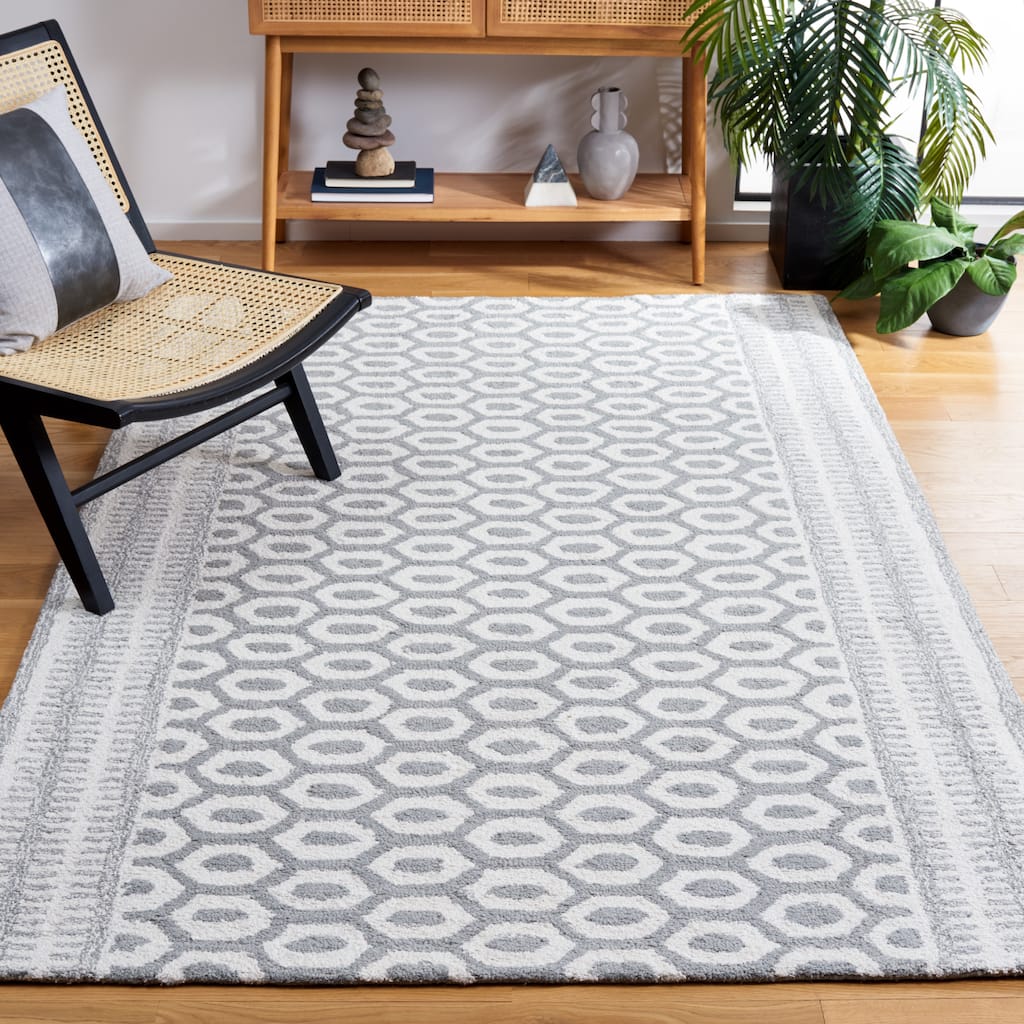 SAFAVIEH Handmade Capri Stoyana Modern Wool Rug