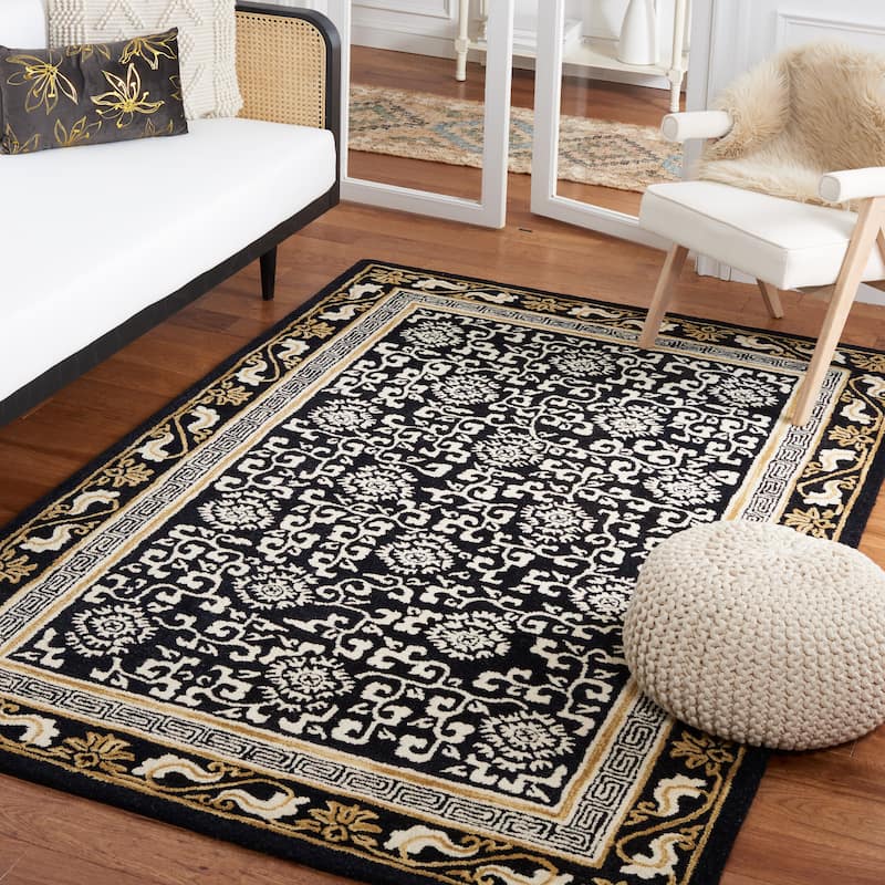 SAFAVIEH Handmade Antiquity Lauresha Wool Rug - 5' x 8' - Black/Ivory