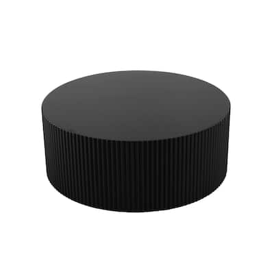 Sleek and Modern Round Coffee Table with Eye-Catching Relief Design