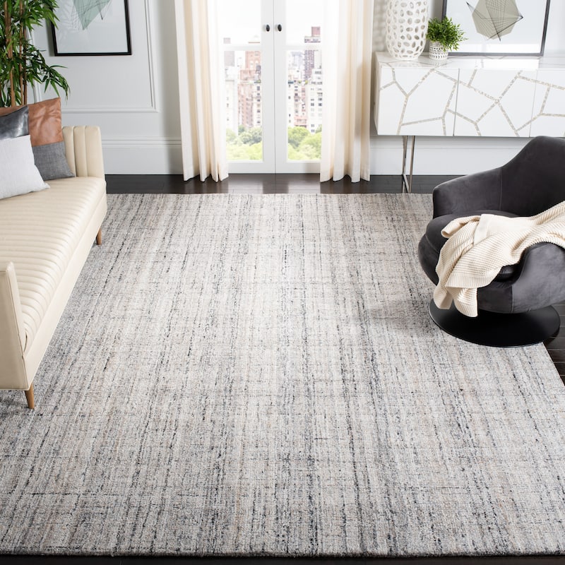 SAFAVIEH Handmade Abstract Nettie Modern Viscose Rug