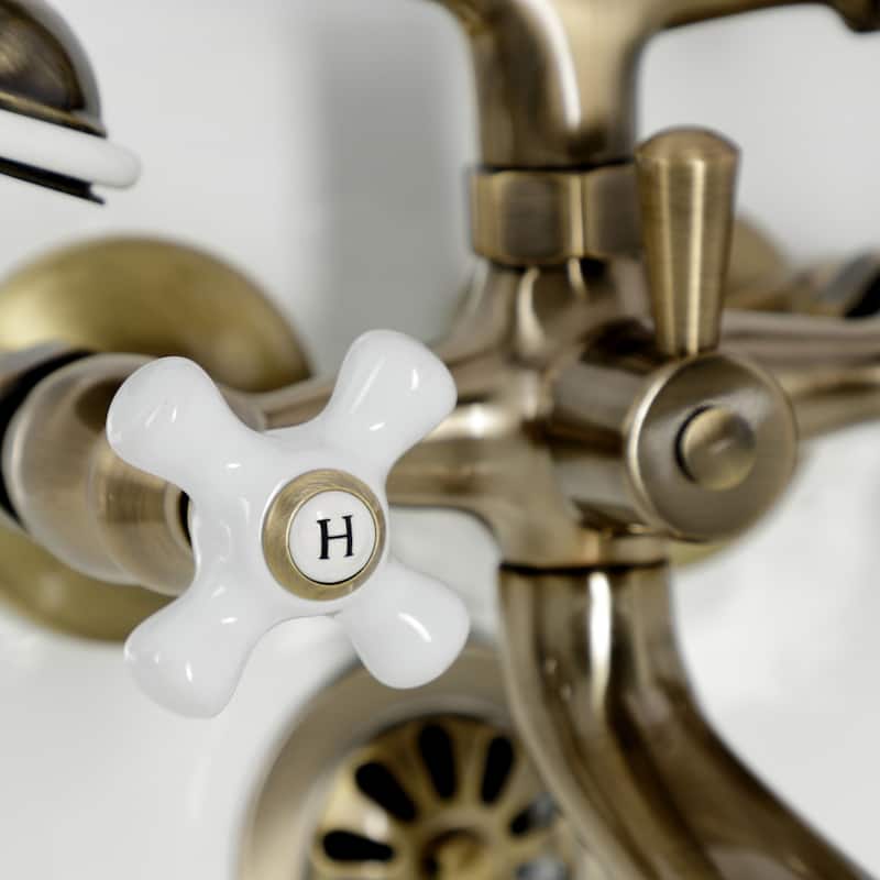 Kingston Brass Tub Wall Mount Clawfoot Tub Faucet with Hand Shower in Polished Chrome