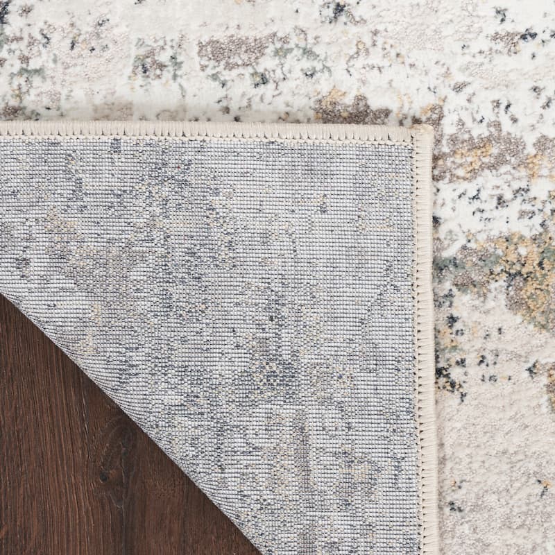 Nourison Distinctive Indoor only Cream / Ivory Abstract Area Rug - 7' 10" x 9' 10"