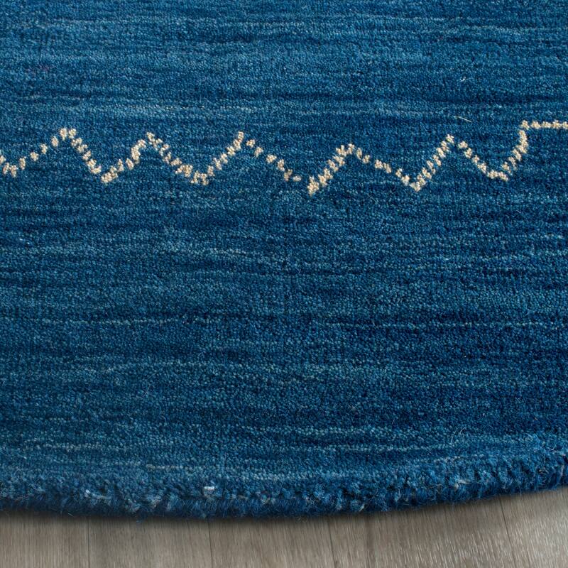 SAFAVIEH Handmade Himalaya Karly Modern Wool Rug