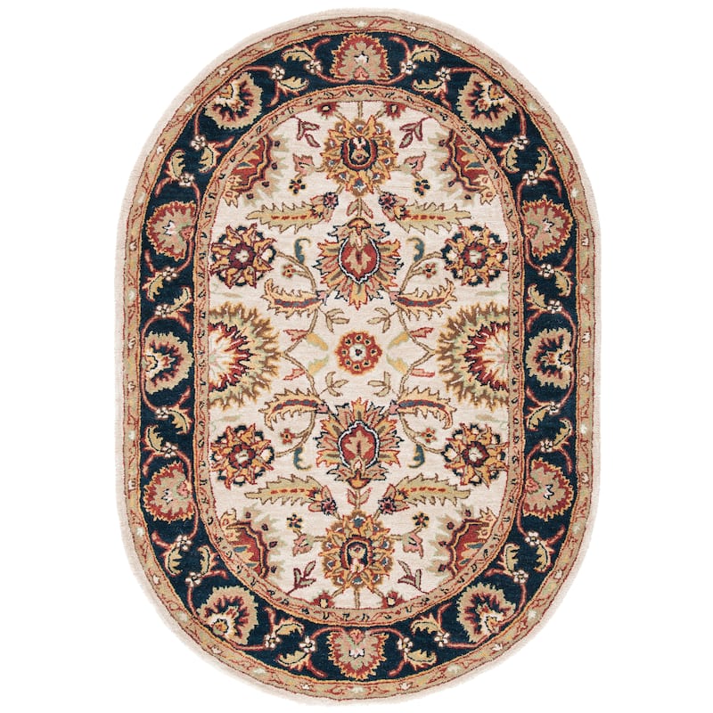 SAFAVIEH Handmade Classic Juliya Traditional Oriental Wool Rug - 4'6" x 6'6" Oval - Ivory/Navy