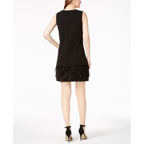 black dress with feathers on bottom