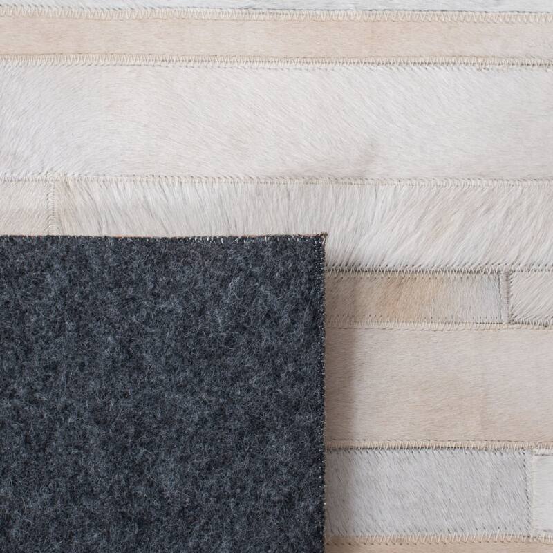 SAFAVIEH Handmade Studio Leather Daniele Natural Hide Leather Rug