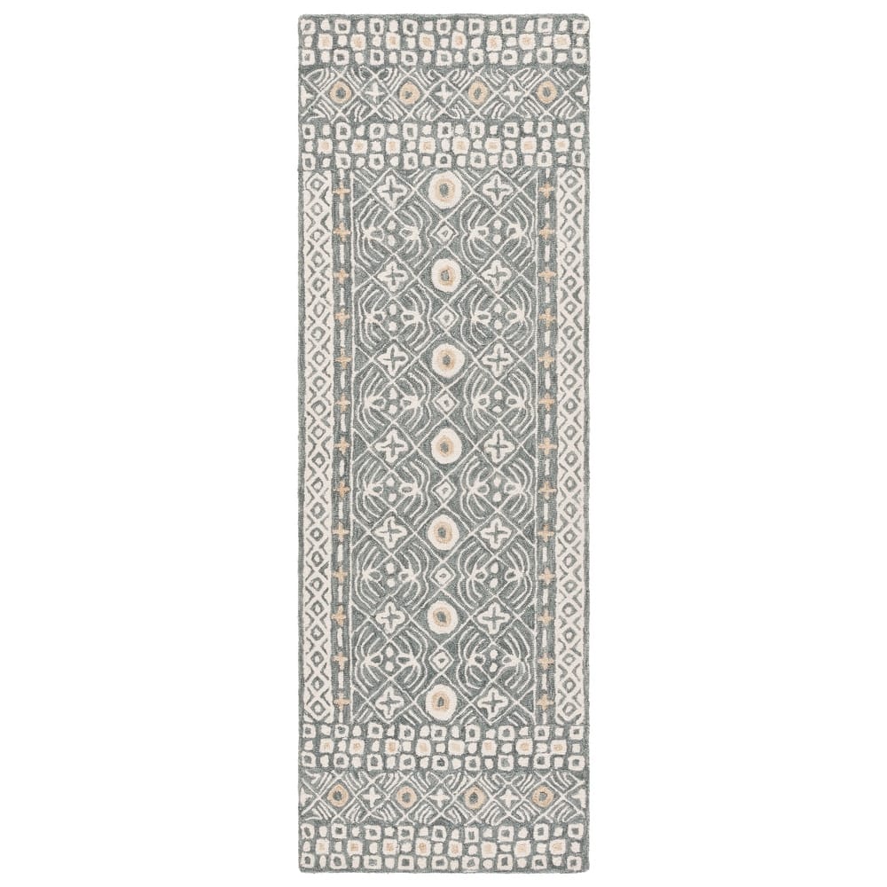 SAFAVIEH Handmade Micro-Loop Reglind Wool Rug