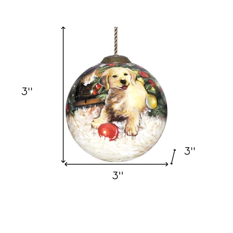 HomeRoots Puppy under the Christmas Tree Hand Painted Mouth Blown Glass Ornament - 3" x 3" x 3"