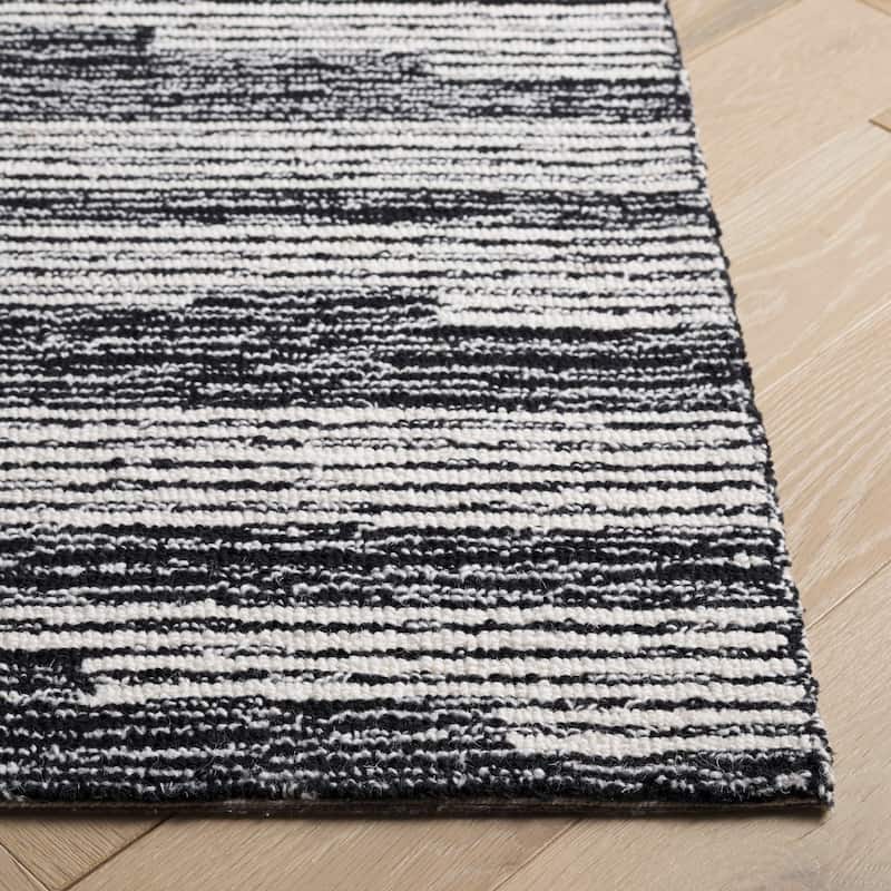 SAFAVIEH Handmade Ebony Mahnaz Modern Striped Wool Rug