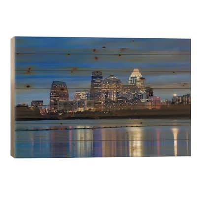 Buildings at the waterfront lit up at dusk, Town Lake, Austin, Texas, USA Print On Wood by Panoramic Images - Multi-Color