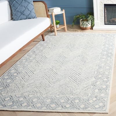 SAFAVIEH Handmade Ebony Rumjana Modern Wool Rug