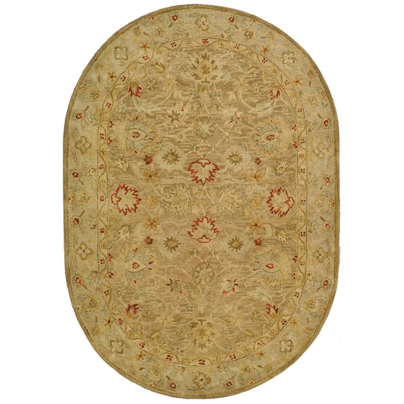 SAFAVIEH Handmade Antiquity Maysoun Traditional Oriental Wool Area Rug - 4'6" x 6'6" Oval - Brown/Beige