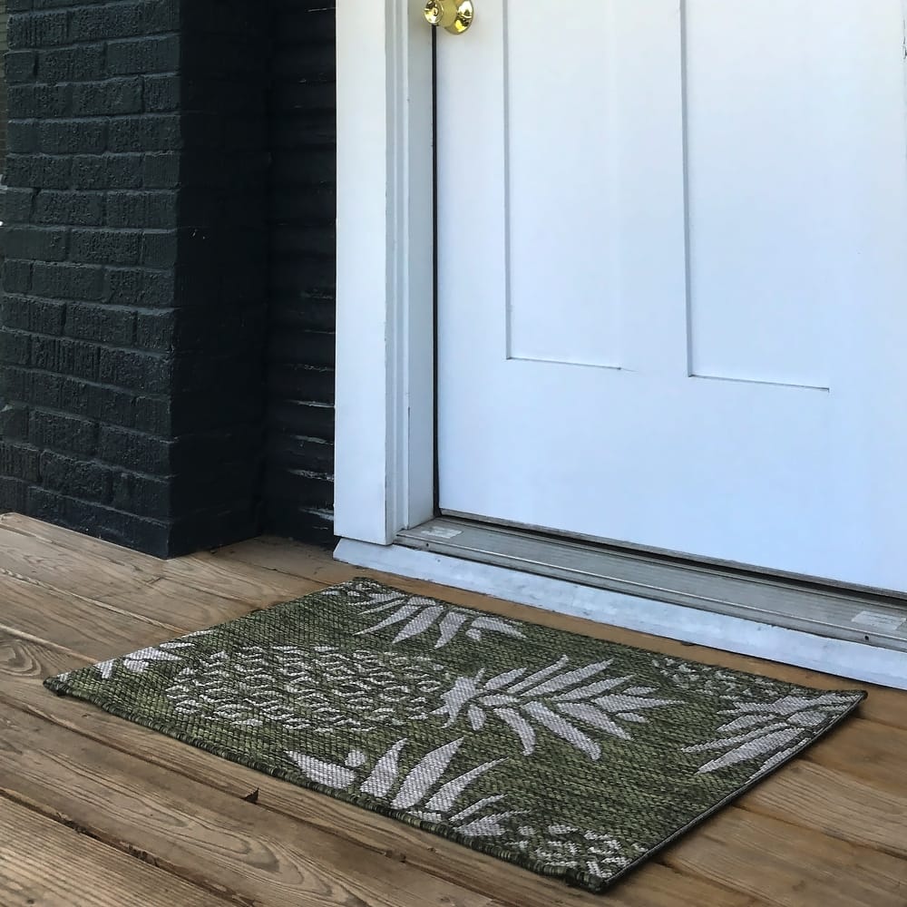 Isola Tropical Indoor/Outdoor Area Rug by Porch & Den