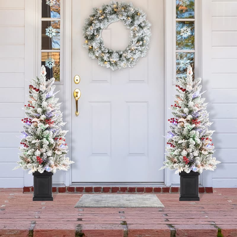 Glitzhome 4ft Pre-Lit Flocked Artificial Christmas Porch Tree with and Red Berries and 60 Warm White/Multi-color Lights - Set of 2