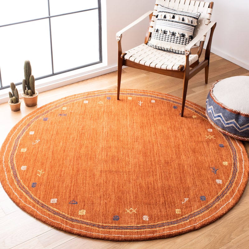 SAFAVIEH Handmade Himalaya Breann Border Wool Rug - 4' Round - Rust - Round