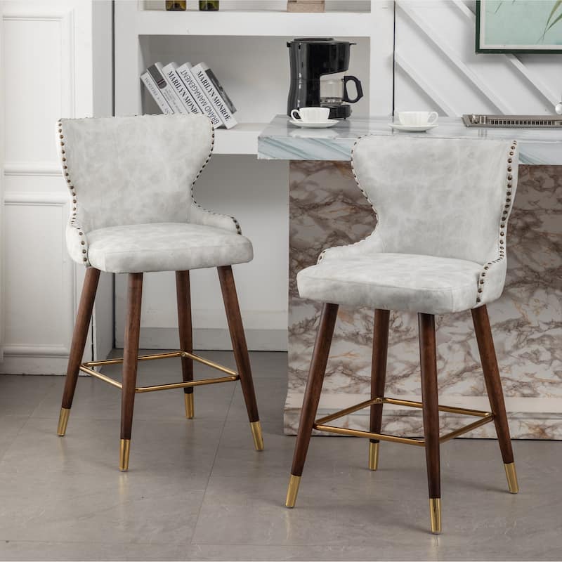 Roundhill Furniture Nevis Mid-century Modern Faux Leather Tufted Nailhead Trim Counter Stool Set of 2