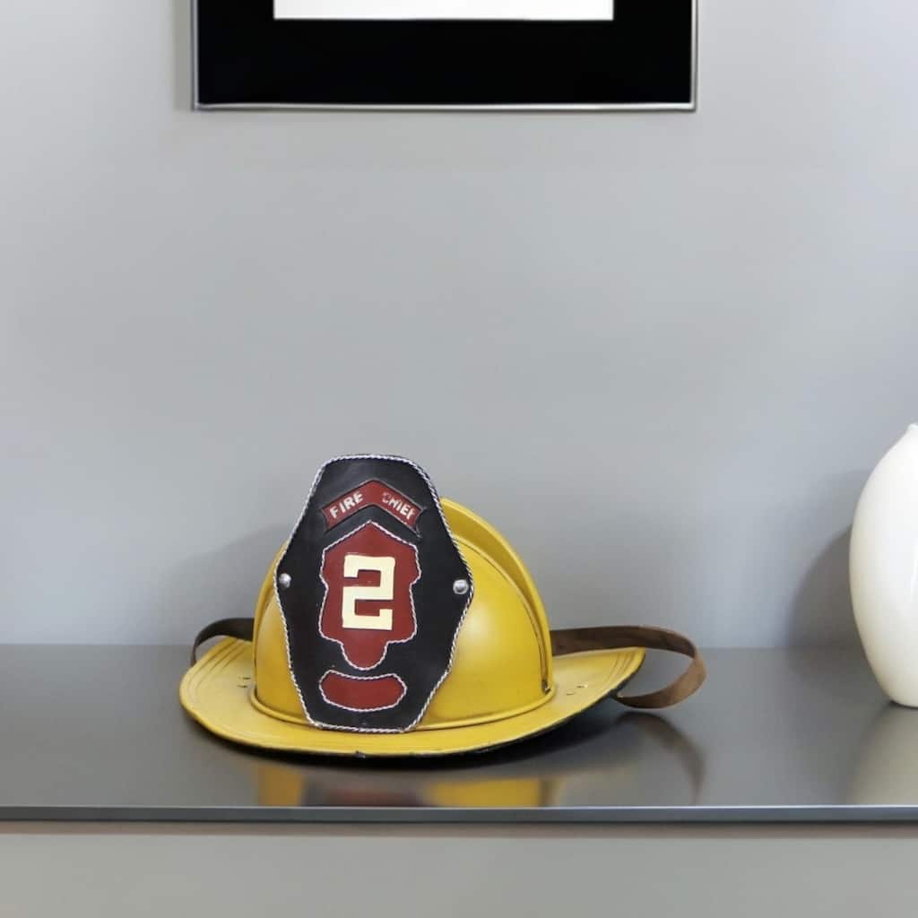 HomeRoots 8" Yellow and Black Metal Fireman Hand Painted Figurine - 14.75' X '8.25' X '12.5