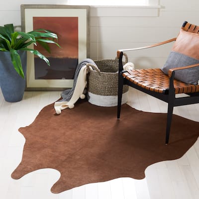 SAFAVIEH Handmade Cow Hide Devendra Cabin & Lodge Rug