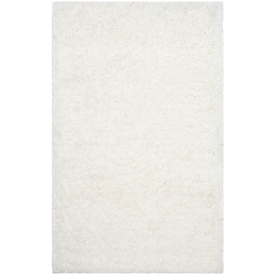 SAFAVIEH Handmade Ryann Shag Anneclaar Solid Polyester Rug