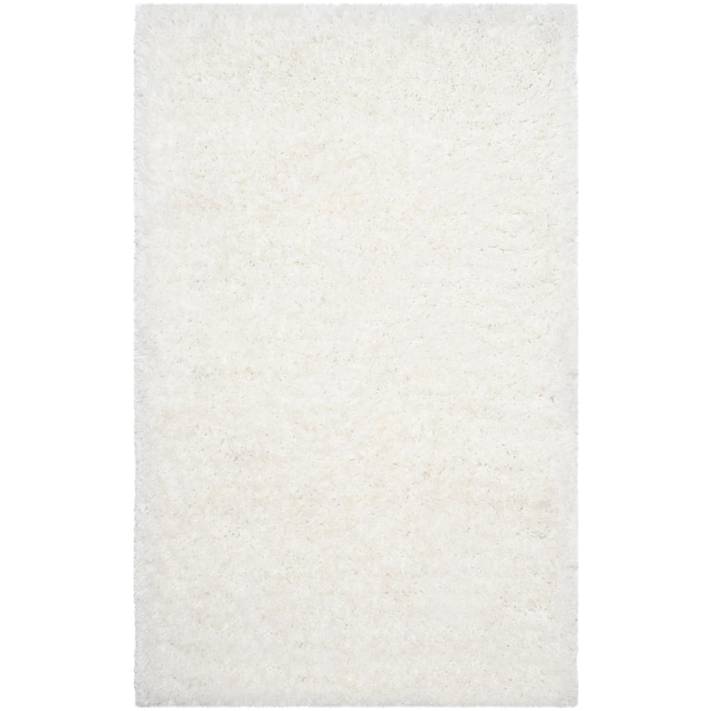 SAFAVIEH Handmade Ryann Shag Anneclaar Solid Polyester Rug