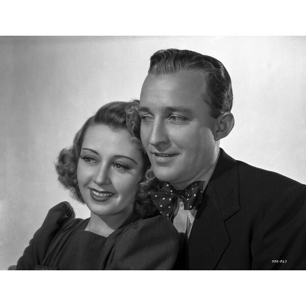 Bing Crosby smiling in Formal Outfit Portrait with White Background High Quality