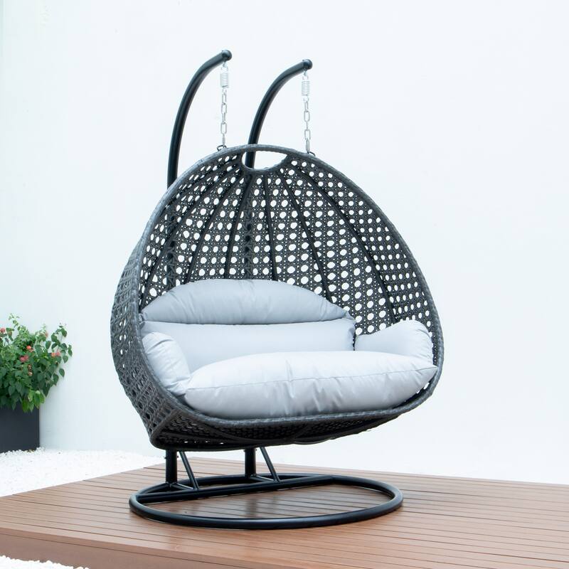 LeisureMod 2-Person Hanging Egg Swing Chair with Metal Stand - Handcrafted Charcoal Wicker, Patio Hammock Lounger with Cushions