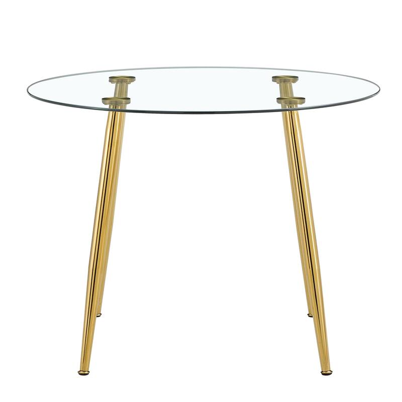 A glass tabletop with a diameter of 40 inches and a modern minimalist circular dining table with gold plated metal legs
